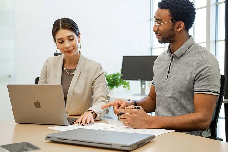 Coworkers working at computers